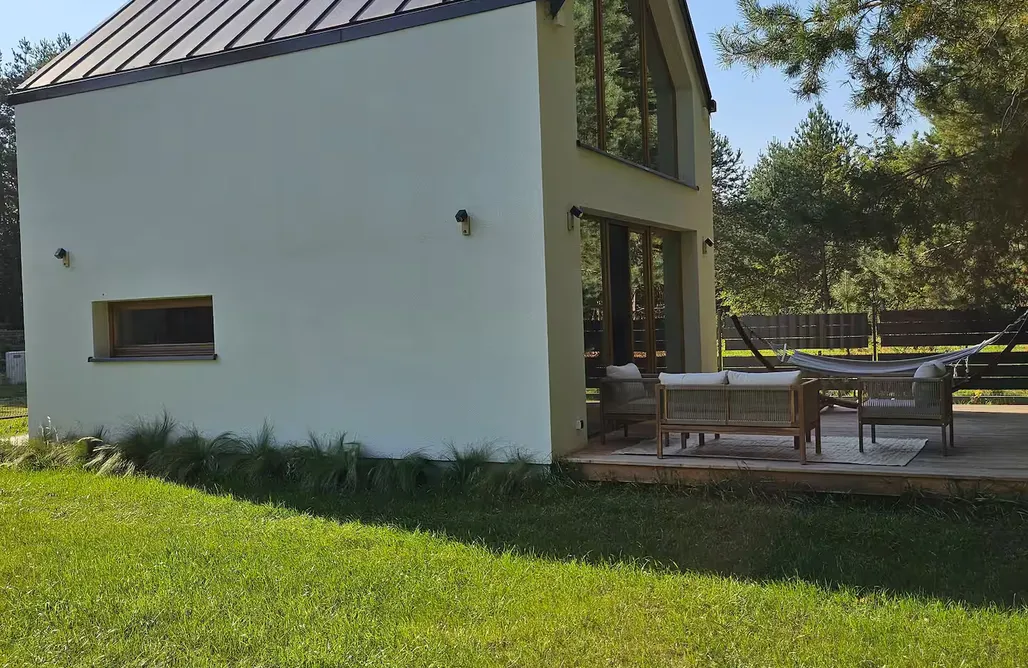 Domki Mielno Przytulny domek z kominkiem i prywatnym ogrodem pośród lasów 3