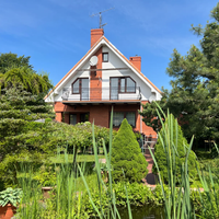 Wioletta gospodarz Willa Garden z pięknym ogrodem i tarasem