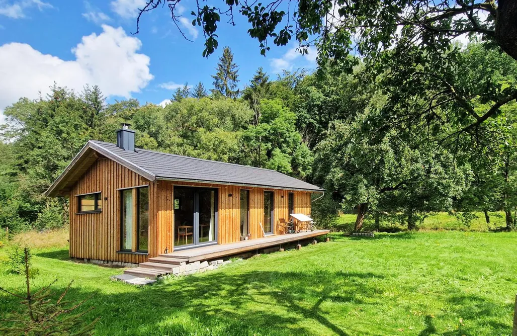 Holzhaus mit Kamin - Am Forellenfluss AlohaCamp