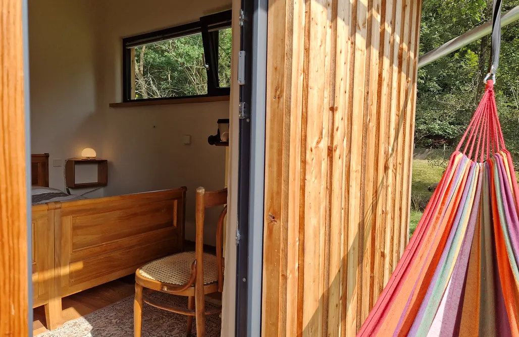 Holzhaus mit Kamin - Am Forellenfluss AlohaCamp